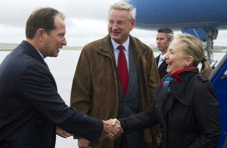 Mark Brzezinski (left), tapped as US ambassador to Poland, greets then secretary of state Hillary Clinton when he was ambassador to Sweden in 2012