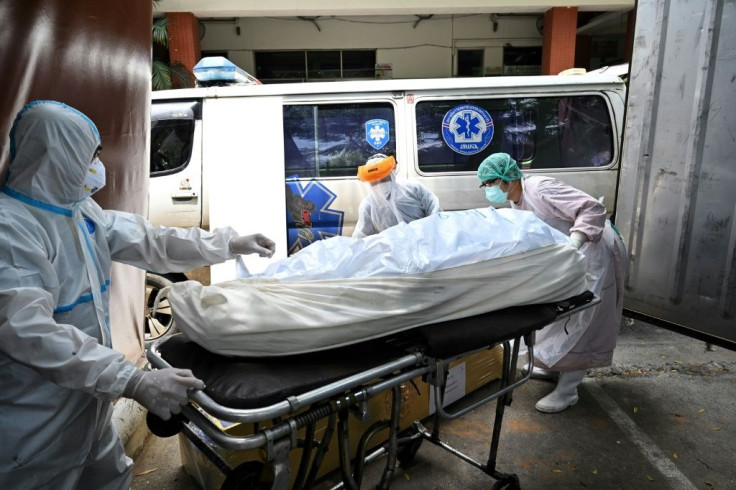 At Thammasat University Hospital, north of Bangkok, staff have had to rent a special container to store bodies after the morgue filled up