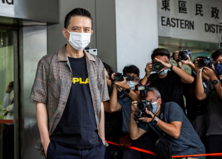 Outside court, Wong serenaded reporters with an old Cantonese song about honesty