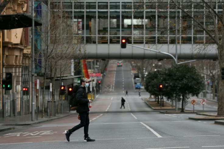 Downtown Melbourne is nearly deserted with the city under lockdown as Victoria state premier Dan Andrews said it was the 'only option' due to the low vaccination rate so far