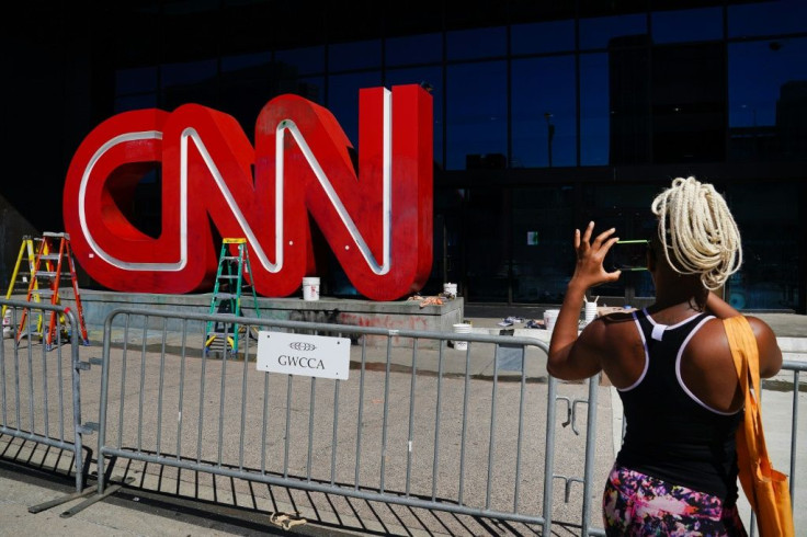 CNN told its staff that three employees were fired for violating the network's coronavirus policy by coming into the office unvaccinated