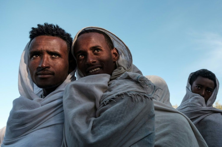 Ethiopian Orthodox pilgrims at Christmas Eve celebrations at Saint George's church on January 6, 2019