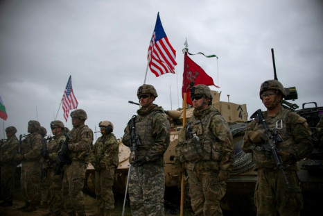 US army soldiers stand in formation during a joint military tactical training exercise with Bulgaria's and Georgia's armies, during the multinational defense exercise Defender Europe 21