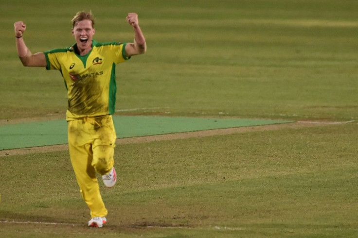 Australia's Nathan Ellis celebrates after taking a wicket during the third Twenty20 against Bangladesh