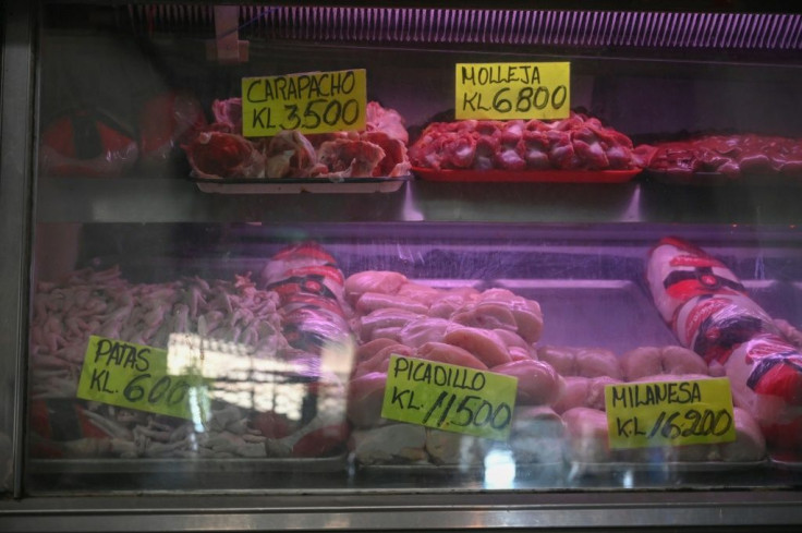 Prices marked in bolivars leave off three of the zeros -- given in thousands rather than millions -- to make them easier to read