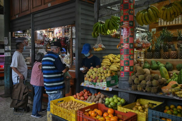 Venezuelans have been rushing to offload their bolivars, creating concern for market stall holders who do not want to be burdened with the banknotes, either