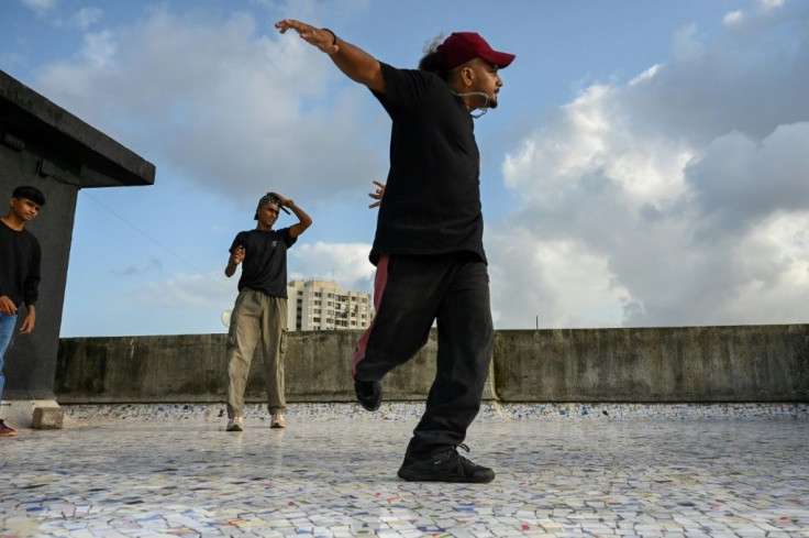 Coach Vikram Godakiya (R)learned breakdancing from YouTube videos -- and for him the school means much more than a steady paycheck