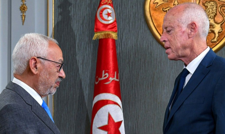 Tunisia's President Kais Saied (R) receives Ennahdha leader and parliament speaker Rached Ghannouchi at the presidential palace in this file picture taken on November 15, 2019