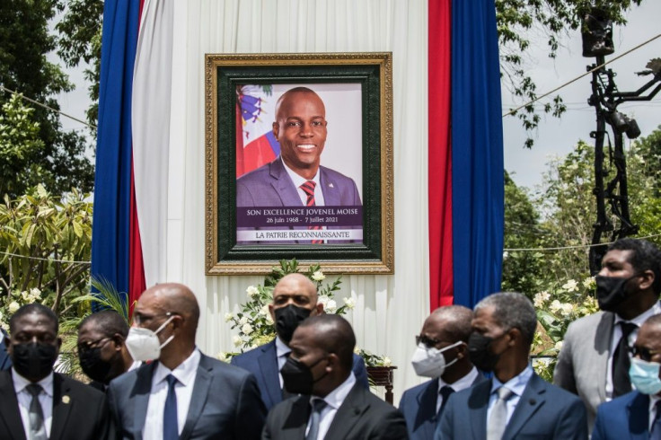 A portrait of late Haitian president Jovenel Moise is seen at a ceremony in his honor in Port-au-Prince on July 20, 2021