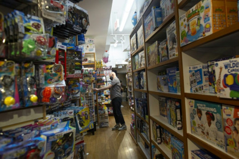 An employee walks in the aisles of Mary Arnold Toys in New York on August 2, 2021; co-owner Judy Ishayik is urging customers to shop for Christmas as early as September due to Covid-linked supply snags