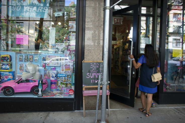 A shopper enters Mary Arnold Toys in New York on August 2, 2021