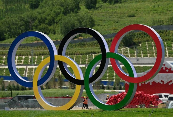 Employees work at the athletes' village for the Beijing 2022 Winter Olympics in Zhangjiakou in northern China's Hebei province