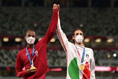Qatar's Mutaz Essa Barshim (L) and Gianmarco Tamberi of Italy shared gold in the men's high jump