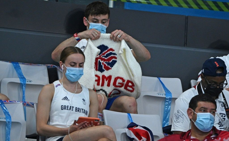 British diver Tom Daley was seen with his knitting poolside