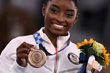 America's Simone Biles won beam bronze after being sidelined for most of the gymnastics competition