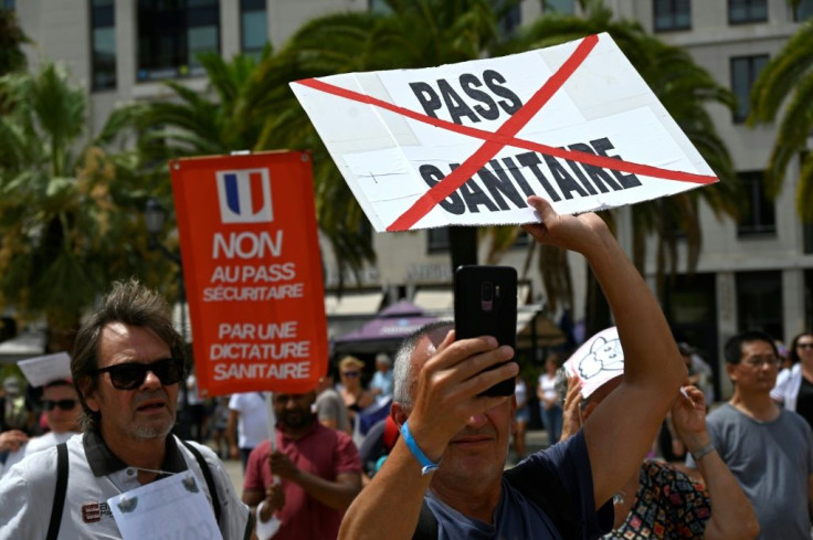 Protesters in the southern French city of Toulon rally against the health pass, on August 7, 2021