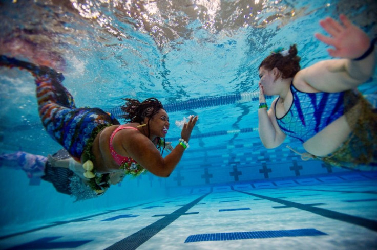 Members of the Society of Fat Mermaids took part in an open swim at the convention