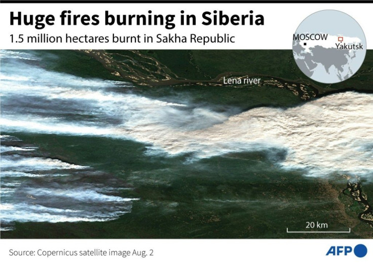 Satellite photo and locator map showing wildfires burning north of Yakutsk in Siberia