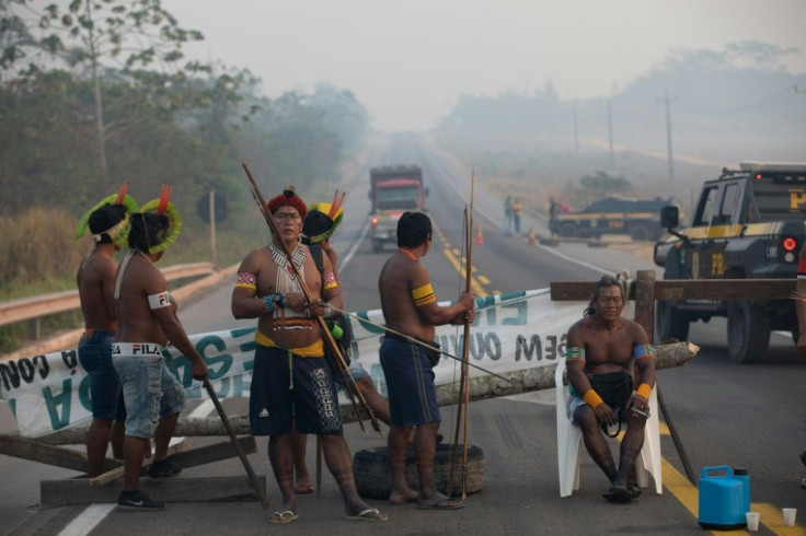 Members of the Kayapo indigenous group block highway BR163 during a protest in the outskirts of Novo Progresso in Para State, Brazil