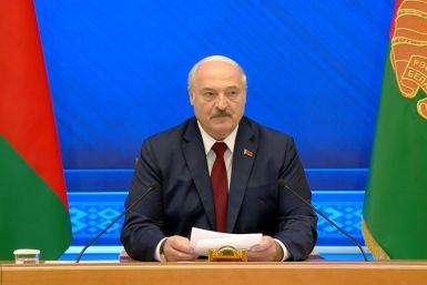 Belarus strongman Alexander Lukashenko addresses media representatives one year after his disputed re-election. In power since 1994, Lukashenko has been cracking down on opponents since unprecedented protests erupted after last year's vote