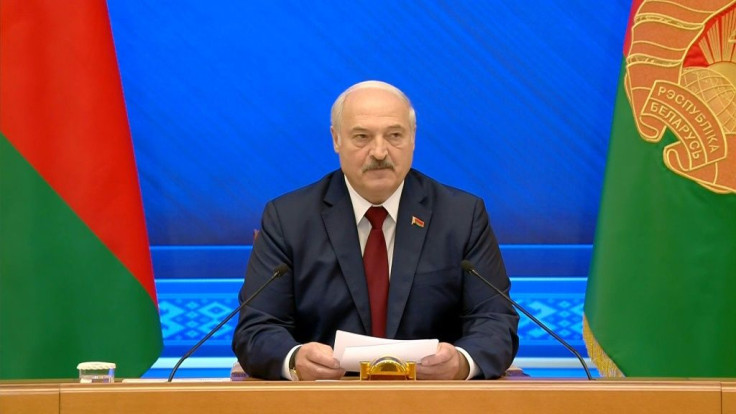 Belarus strongman Alexander Lukashenko addresses media representatives one year after his disputed re-election. In power since 1994, Lukashenko has been cracking down on opponents since unprecedented protests erupted after last year's vote