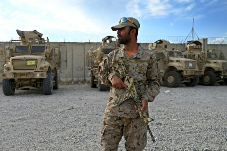 An Afghan policeman stands guard inside Bagram US air base in July 2021 after all US and NATO troops left