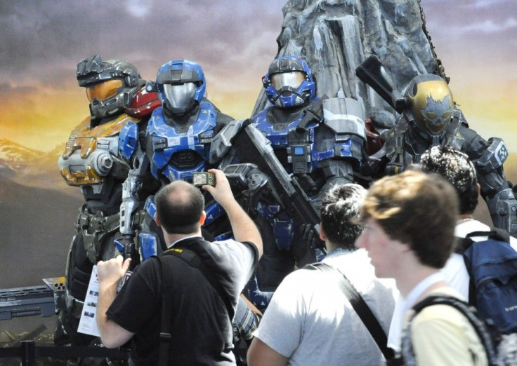 Crowds walk past the Halo Reach display at the Los Angeles Convention Center Electronic Entertainment Expo (E3) in LA