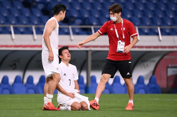 Tears: Japan's Takefusa Kubo cries after the defeat in the Olympic Games bronze medal match against Mexico