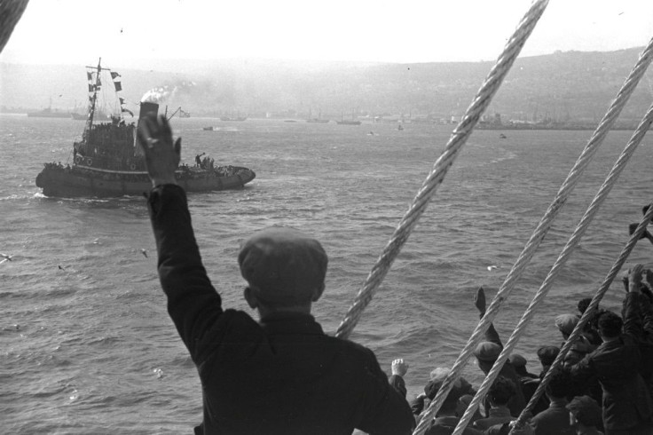 A handout picture released by the Israeli Government Press Office shows European Jews abroad the S.S. Galila arriving in the Israeli port city of Haifa