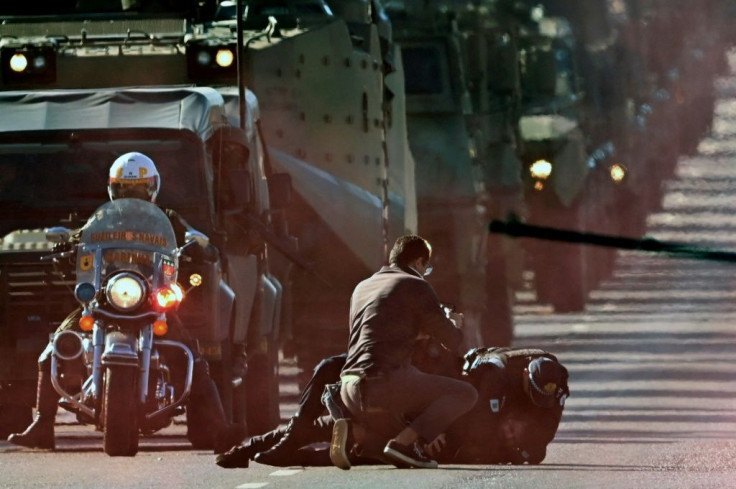 Soldiers arrest protesters trying to block a military parade in Brasilia