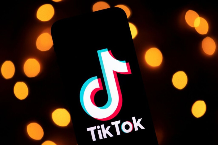 This file photo taken on November 21, 2019 shows the logo of the social media video sharing app TikTok displayed on a tablet screen in Paris