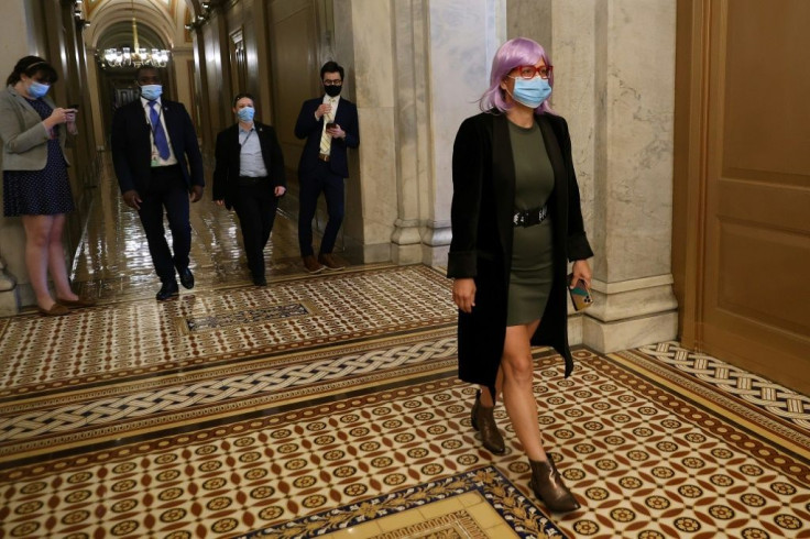 Kyrsten Sinema leaves the US Capitol following a vote in May