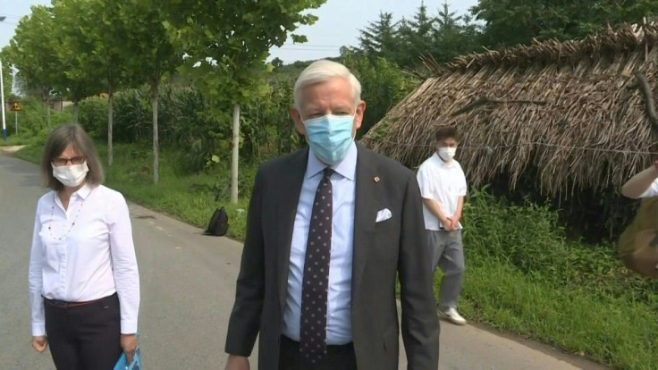 IMAGES Canadian Ambassador to China Dominic Barton arrives outside the Dandong Detention Centre ahead of a verdict expected in the trial of Canadian businessman Michael Spavor who is detained on spying charges.