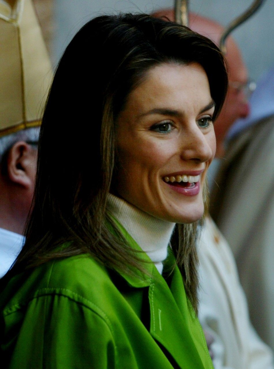 Spanish Princess Leticia Ortiz smiles after arriving for Easter Sunday mass at Palma de Mallorca.