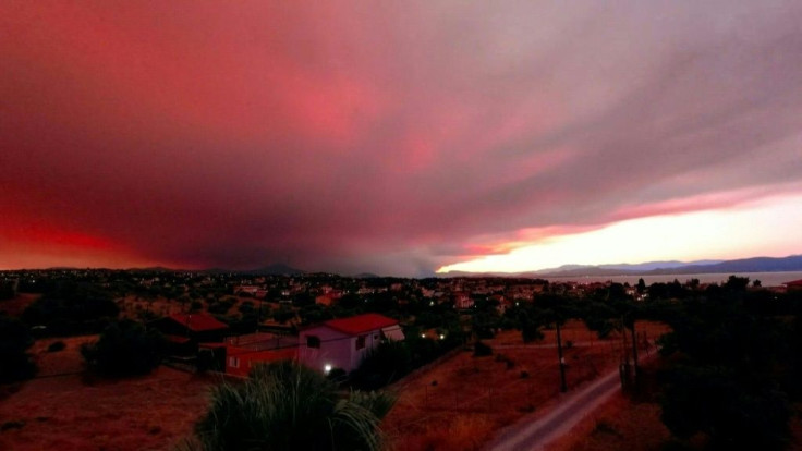 A timelapse video shows the sky above the island of Evia turning into a red haze during sunset due to the wildfires that have been raving the Greek island.