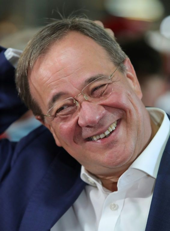 CDU leader Armin Laschet smiles during a visit to a youth camp in Frankfurt as he campaigns for September's elections