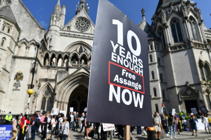 Dozens of Assange supporters gathered outside the Royal Courts of Justice in central London