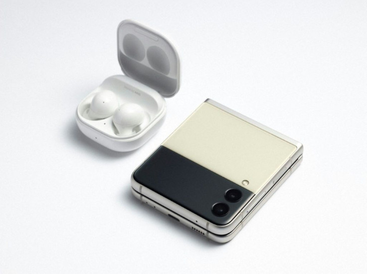 This undated photo released on August 11, 2021 courtesy of Samsung shows the Samsung Galaxy Z Flip3 5G smartphone and Galaxy Buds2