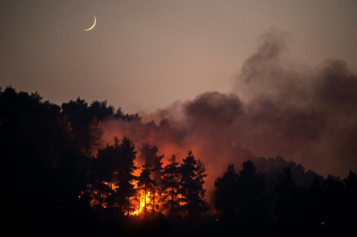 Nearly 900 firefighters are battling the wildfire that has raged for nine days on the Greek island of Evia, gradually bringing it under control