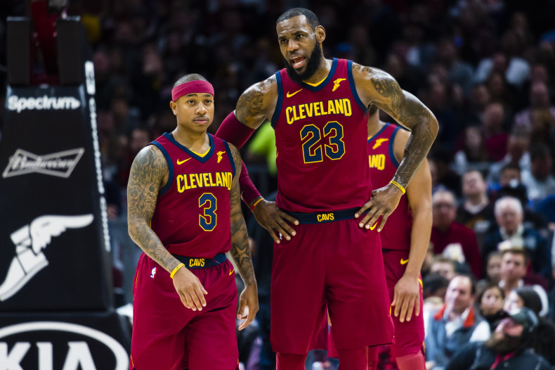 Isaiah Thomas #3 listens to LeBron James #23 of the Cleveland Cavaliers