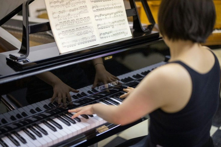Pianist Xiaowen Shang plays a Rippen cast aluminium Grand Piano, made in the Netherlands in 1965