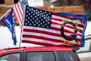 An American flag endorsing QAnon, one of the conspiracy theories cited by a father who confessed to killing his children because he believed it would save the world from "monsters"