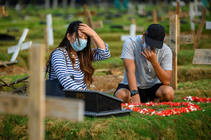 Tirsa Manitik (left) and Erik Alexander's daughter was 29 days old when she died after contracting Covid-19