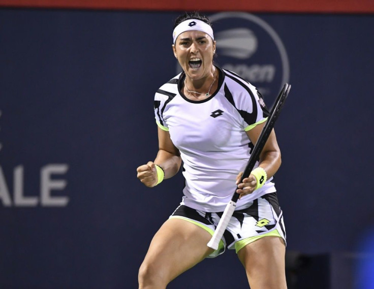 Tunisia's Ons Jabeur on the way to a third-round victory over defending champion Bianca Andreescu in the WTA hardcourt tournament in Montreal