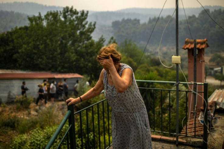 Rain and a drop in temperatures helped firefighters in Greece gain a hold on the active fronts on the island of Evia and the Arcadia region