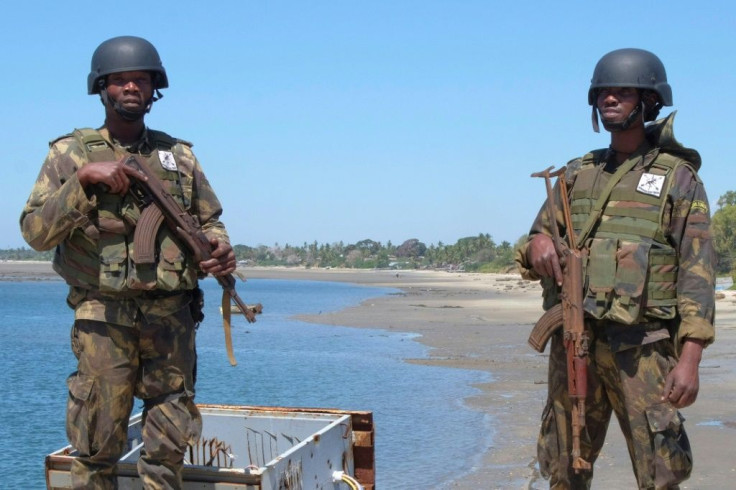 Mozambique soldiers stand guard at the strategic port