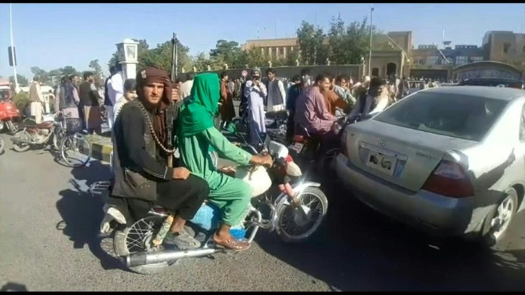 Taliban fighters are seen outside a police station in Herat, Afghanistan's third biggest city. Duration 00:31