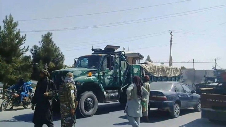 IMAGES of Afghan security forces in military vehicles surrendering to the Taliban Hundreds of Afghan soldiers who retreated to the airport outside Kunduz after the Taliban captured the northern city at the weekend have surrendered, a local lawmaker told A