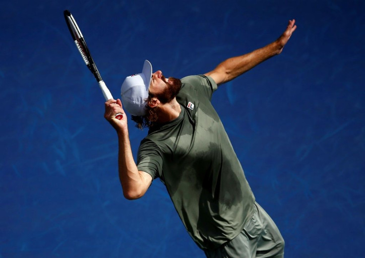 Upset winner: American Reilly Opelka serves on the way to a semi-final win over third-seeded Stefanos Tsitsipas at the ATP Toronto Masters