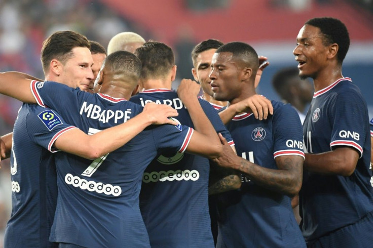 PSG players celebrate after scoring in their 3-2 win over Strasbourg